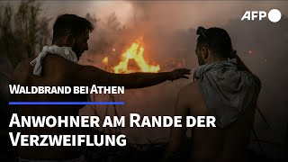 quotDas Feuer kommt von überallquot Anwohner entsetzt über Waldbrand bei Athen  AFP [upl. by Mclaughlin]