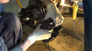 How to change rotors and pack wheel bearings on ford truck [upl. by Chitkara811]