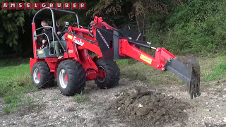 Baggerarm für Hoflader  Amselgruber Landtechnik  Fuchs F 1244 Hoflader mit Dominator Baggerarm [upl. by Acquah]