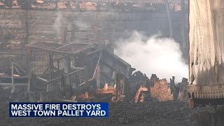 Rubble of West Town pallet yard destroyed in fire still smoldering 24 hours later [upl. by Euhsoj]