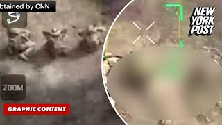 Russians appear to gun down surrendering Ukrainian soldiers disturbing drone footage shows [upl. by Eirrab]