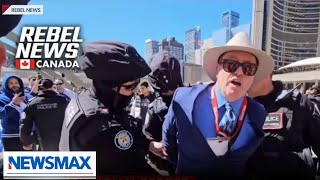 Canadian police are acting like Antifa Reporter speaks out after being arrested  National Report [upl. by Erleena]