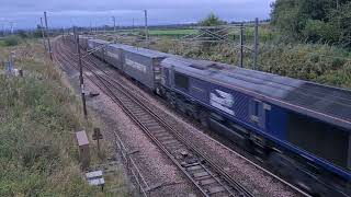 Class 66 passes Quintinshill Loops with a late running container train 5924 [upl. by Haianeb]