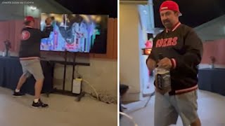 Angry 49ers fan smashes TV with whiskey bottle after team loses Super Bowl [upl. by Xirdnek3]