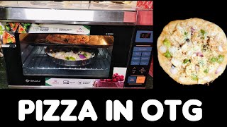 shops style veg pizzaHomemade pizza in otg ovenBest pizza recipe paneer pizza [upl. by Gibson]