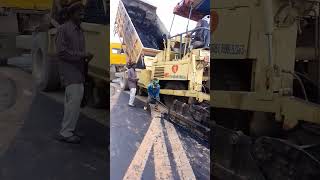 Dense bituminous Macadam DBMlaying in Gwalior Airport Car parking road with Paver Machine [upl. by Zarla502]