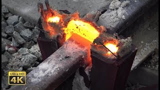 Rails thermite welding  Eruptions melt squeezing and grinding 4K [upl. by Acir946]