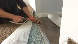 How to install a carpet to vinyl transition strip on concrete [upl. by Ellenaej]