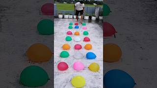 The balloon man jumps onto water balloons randomlyfunny race trending balloon challenge sports [upl. by Phelgen]