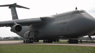 C5C Galaxy  Towing and takeoff at AirVenture 2010  Oshkosh [upl. by Aicnelav989]