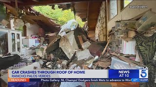 Car crashes through roof of Rancho Palos Verdes home [upl. by Hefter]