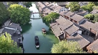 Visiting Chinas 1300yearold water town Wuzhen [upl. by Sedaiuqlem]