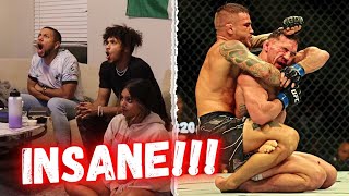 HILARIOUS Reaction to Dustin Poirier and Michael Chandlers INSANE WAR at UFC 281  Throwback fight [upl. by Buyer]