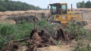 Craig Manufacturing  Land Clearing Rake on a Volvo Wheel Loader [upl. by Zedekiah]