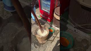 Traditional way of pounding yam with mortar and pestle [upl. by Daren883]