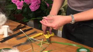 Triangle Nursery  Creating a buttonhole with a Calla Lily [upl. by Necaj12]