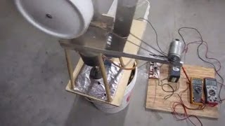 Stirling engine runs fan pump charges battery at same time [upl. by Akialam]