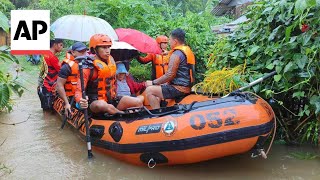 Storm floods northern Philippine regions disrupting schools work and travel [upl. by Wales]