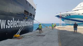 Cruise ship bring along side with help of mooring ropes [upl. by Urania]