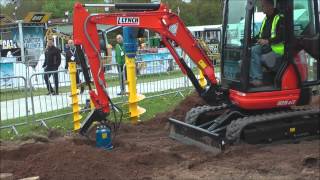 Mini excavator working with auger [upl. by Rabassa]