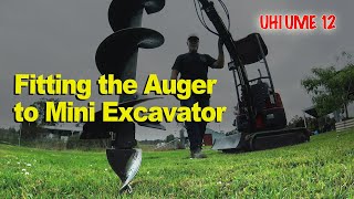 Fitting the Auger to Mini Excavator UHI UME 12 [upl. by Ydnal651]