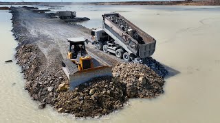 Largescale road expansion is made possible by advanced rock mixtures dump trucks bulldozer D60P [upl. by Ponzo]