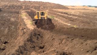 Cat D7 pushing in a trench [upl. by Intisar]