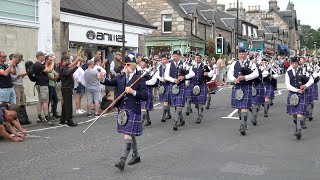 United Maniacs Pipes amp Drums from Switzerland playing on the march to 2023 Pitlochry Highland Games [upl. by Ahseniuq]