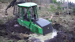 John Deere 1110E stuck deep in mud saving with homemade forwarder extra fotage [upl. by Manlove]