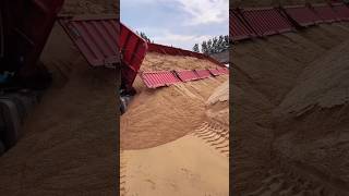 The process of truck tipping over to unload sand [upl. by Acirt]