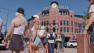 Street Vendor And Pedestrians Outside Coors Field Baseball Stadium Denver Colorado USA [upl. by Ahterahs]