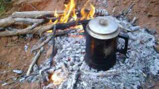 water purifier purifiying water from the creek Wilderness Survival [upl. by Annavoj254]