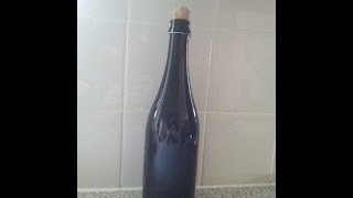 Corking Belgian Beer Bottles with a hand corker [upl. by Egag]