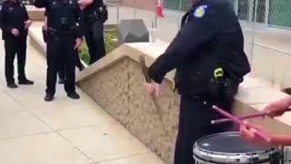 Police officer shows off baton twirling skills in California [upl. by Naus]