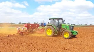 John Deere 6110B planting soyabeans [upl. by Arreyt]