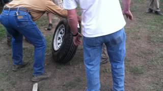 Mounting a tire with carburetor cleaner [upl. by Auohs652]