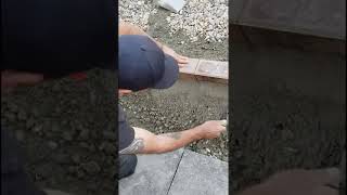 Haunching concrete using a gauging trowel setting in 80mm block pavers 🔥shorts [upl. by Surat]