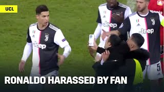 Cristiano Ronaldo Gets Harassed By Pitch Invader [upl. by Einahpad]