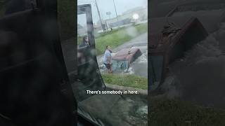 Man Risks Life to Save Truck Driver Trapped in Flooding [upl. by Cormack]