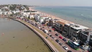 Aerial footage of Sandbanks and Poole Harbour Dorset UK [upl. by Oigufer]