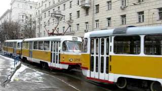 Tatra T3 tram is pulling another two rail cars of T3 towards Voikovskaya metro station Moscow [upl. by Siramaj]