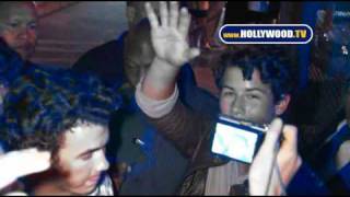 EXCLUSIVE Jonas Brothers Leave Ponyo Screening ViaBackdoor [upl. by Terpstra]