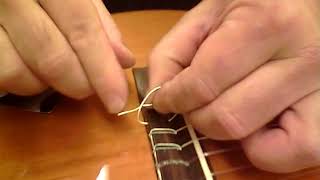 TUTORIAL Como colocar cuerdas Guitarra Clasica Puente  Guitar Shop Barcelona [upl. by Jedediah460]