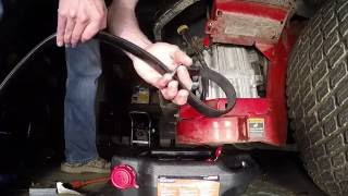 Removing Stuck Oil Filter with Belt Strap [upl. by Arahk]