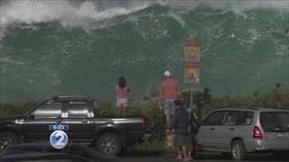 Large surf batters Oahus North Shore [upl. by Nneb]