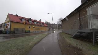 Sweden Stockholm short walk outside Huddinge huvudbibilotek in snowy rain [upl. by Anilet]