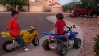 Motorcycle 4 year old on ATV 12 volts versus 7 year old on Motorcycle 36 volts [upl. by Caye]