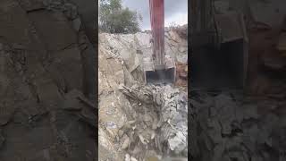 Excavator crushing shale rock process [upl. by Cutcliffe]