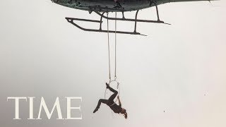 Woman Hangs From Her Teeth And Toes From A Helicopter Over Niagara Falls Breaks World Record  TIME [upl. by Aillil]