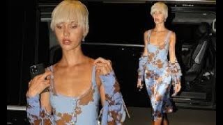 Iris Law stuns as she slips into a slinky blue patterned threepiece for the Versace party [upl. by Raeann]